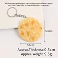 Realistic PVC cookie keychain with round soda cracker texture and silver metal chain - Round Soda Biscuit Keychain