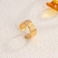 Polished 18K gold plated titanium steel open ring with textured feather embossed design - Wave Embossed / Gold