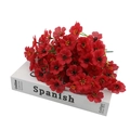 Vibrant red artificial violet bouquet with yellow stamens on a white background - Red