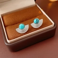 Detailed macro view of vintage turquoise fan-shaped stud earrings in silver finish - Silver (Silver Pin)