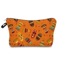 Detail of orange African drum print makeup bag with durable fabric and black zipper - Orange Mask Drum