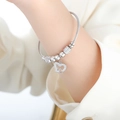 Silver twisted wire bracelet featuring polished beads and a sparkling pavé heart charm - Double Heart (Z251) / Steel (Z251)