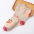 Beige cotton socks with pink dots and strawberry patterns on a wooden tray - Khaki Big Strawberry