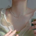 Elegant pearl necklace featuring double diamond butterfly pendants and delicate tassel drop - SY314-Rhinestone Butterfly Pearl Tassel Necklace