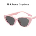 Pink cat-eye sunglasses with dark grey lenses for a retro chic summer fashion look - Pink Frame Grey Lens