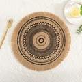 Macro detail of round jute placemat with black geometric pattern and fringed edges - Natural Jute Tassel Black Pattern 2