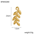 Detail of gold leaf pendant showing plant texture with dimensions 2.6cm by 1.2cm - Single Leaf-Gold
