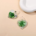 Detail of heart-shaped glass pendant with green floral patterns and gold dust accents - Green (Type A)