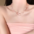Close-up of pink crystal and pearl beaded layered necklace on a female collarbone - Multi-layer Beaded Style / Pink White Crushed Stone Pearl (2#)