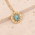 Detail of a vintage gold sunburst pendant with an oval turquoise stone and fine chain - Turquoise Sun Pattern Style (5#)