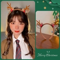 Detail of Christmas reindeer antler headband with plush balls, glitter ears and red berries - 33# Mushroom Fur Ball Brown
