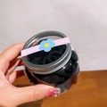 Bulk black high elasticity hair ties in a clear cylindrical jar with a silver lid - Jar / Black