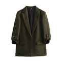 Detailed view of rolled three-quarter sleeves with gold button and flap pockets on olive blazer - S / Olive Green
