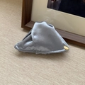 Close-up of silver-grey satin fabric shark hair claw with gold button detail - 18# Hair Claw / Blue
