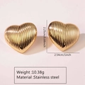 Macro view of golden heart earrings featuring unique radial pleated texture and dimensions - Stainless Steel Radiating Pleated Heart