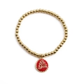 Pulsera elástica de cuentas doradas con colgante de chapa roja y frase Be Free - Rojo