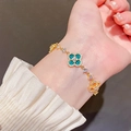 Gold clover bracelet with green malachite stone and white zircon pave on wrist - Green
