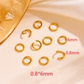Detail shot of 18k gold plated stainless steel jump rings in 0.8x6mm size for jewelry DIY - Gold Open Jump Rings 0.8x6mm (100pcs/pack)