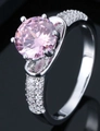 Elegant silver ring with a round pink cubic zirconia in a secure six-prong setting - Ur0587a