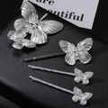 Set di 4 fermagli per capelli a farfalla in metallo argento dal design elegante - Set di 4 argento come mostrato / Argento
