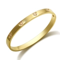18K gold-plated oval bangle with four sparkling crystal-inlaid heart motifs - Heart Starry Encrusted / Gold