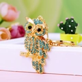 Charming golden owl keychain with blue rhinestones and black gem eyes as bag charm - A430 Owl M Blue
