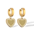 Close-up of gold-plated heart pendant earrings with zircon stones on white backdrop - Hollow Grid Heart Gold