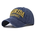 Close-up of vintage Florida gold embroidery on navy blue washed denim baseball cap - Adjustable / Navy Blue