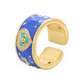 Close-up of gold evil eye ring with blue enamel and sparkling crystal heart design - Adjustable Open / Dark Blue