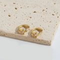 Exquisite golden flower stud earrings with a small diamond center in a minimalist style - Bow