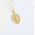 Gold Virgin Mary pendant necklace with sparkling white zircon bezel on white background - Oval Virgin Mary XL3497