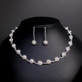 Elegant silver wedding jewelry set featuring white pearls and shimmering rhinestones - TL034/Silver Pearl Pave Zirconia Set