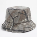 Close-up of washed camouflage bucket hat with white paint splatters and stitched brim - One Size (58cm) / Bionic Tree Branch Camouflage