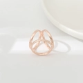 Detail view of the rose gold triple-intertwined ring with a polished geometric finish - BZ238-2 Rose Gold 3-Ring Geometric Triangle