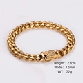Macro detail of gold Cuban link bracelet featuring a lion head box clasp and diamond inlay - 12mm Width Bracelet (23cm) / Gold