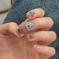 Press-on nails with silver metal crosses, heart rhinestones, and star accents on denim background - HY284 Chrome Heart Metal Rhinestone