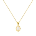 Macro shot of gold oval pendant featuring a white disc and an engraved letter S - Letter S