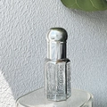 Hexagonal transparent glass perfume bottle with silver cutout metal pattern finish - Silver
