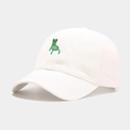 White cotton baseball cap with cute green frog embroidery in a clean flat lay view - White