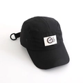 Detail of black quick-dry five-panel cap with embroidered GO patch and adjustable strap - 52cm / Black