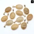 Oval tawny agate gemstone pendant with gold-plated copper rim finish, numbered 4 - Yellow Jade