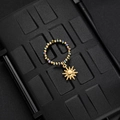 Detailed close-up of a beaded ring with colorful gemstones and a golden sun pendant - Multicolor Bead Sun Style (F-R584)