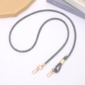 Gray denim braided phone lanyard with adjustable gold buckles on a clean white background - Adjustable Crossbody / Navy Blue