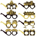 Set di 8 occhiali di carta glitterati nero e oro per il 18° compleanno accessori foto - 18° compleanno
