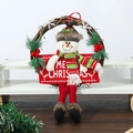 Detail of Christmas snowman rattan wreath decoration with Merry Christmas sign on white stand - Snowman Long Leg Wreath