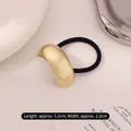 Gold convex metal hair tie with black elastic band in a minimalist modern style - Large Single Row Gold
