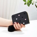 Short black women's wallet with heart embroidery and large plush pompom keychain - Black