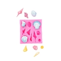 Stampo in silicone rosa per fondant a conchiglia con campioni pastello su sfondo bianco - Piccolo—Rosa
