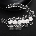 Bridal hair comb featuring white resin roses, pearls, and crystals on a silver wire base - White Rose Artificial Pearl Hair Comb (HS-J4744)