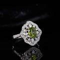Elegant S925 sterling silver ring with green marquise gemstone and diamond accents - Peridot Flower Reflection Style (LR312)